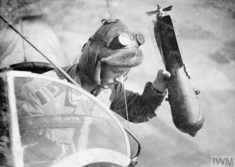 pilot-dropping-bomb.jpg.886c0e8ddc5d50b363e3e47150c6cb32.jpg.564c905481ec32962274f75e64b7f20c.jpg